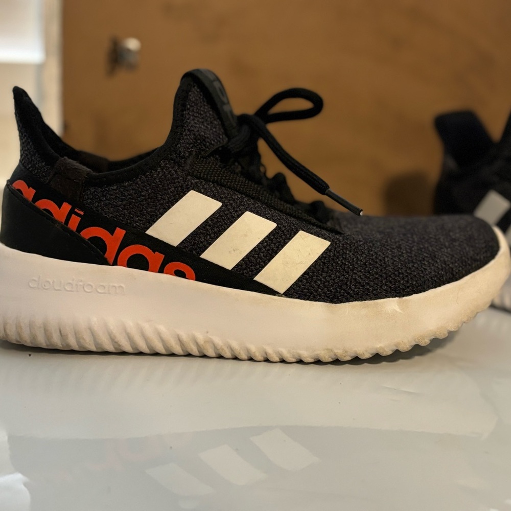 Adidas Black Knit Sneakers with White and Orange Accents